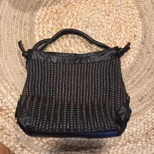 Basket weave brown purse.
